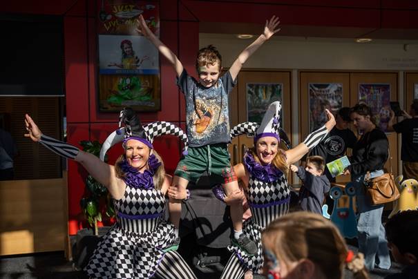 A group of people in clothing

Description automatically generated