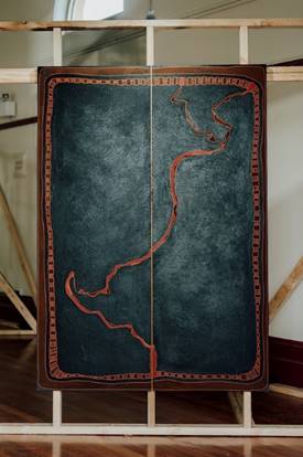 A large blue and red piece of art

Description automatically generated