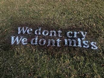 A sign on the ground

Description automatically generated