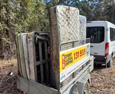 A van with mattresses on it

Description automatically generated