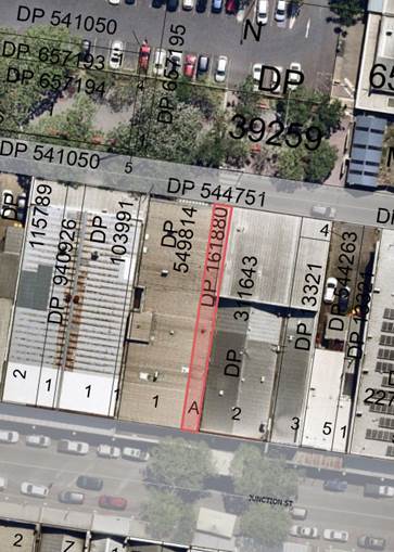 Aerial view of a warehouse

Description automatically generated