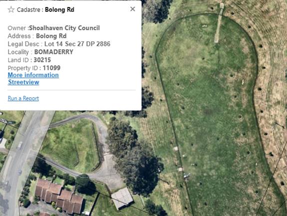 A bird's eye view of a golf course

Description automatically generated