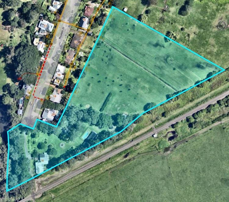 A aerial view of a green area

Description automatically generated