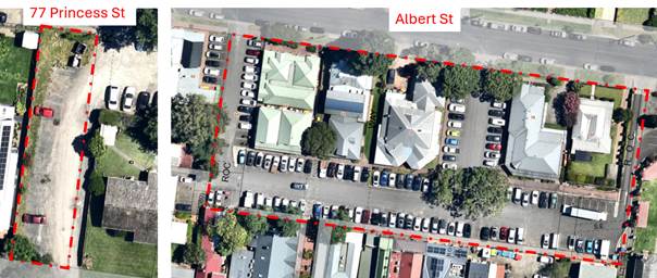Aerial view of a neighborhood with cars parked in the parking lot

Description automatically generated