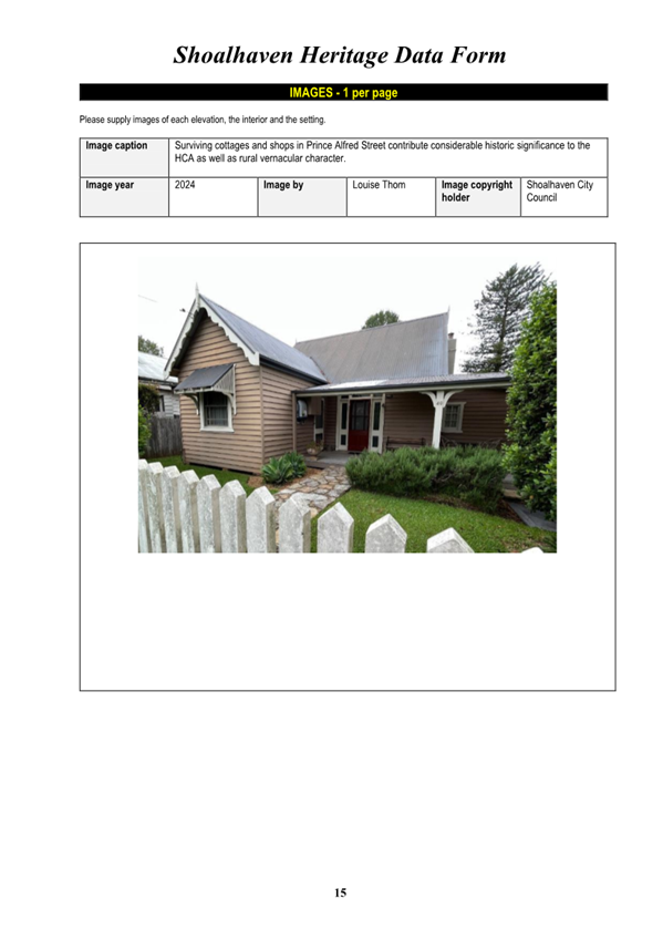 A house with a white fence

Description automatically generated