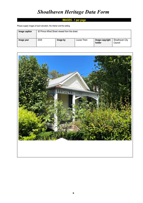 A house surrounded by bushes

Description automatically generated