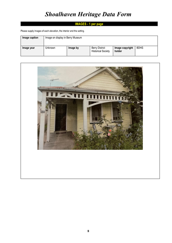 A house with a porch

Description automatically generated