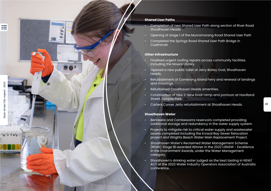 A person wearing goggles and gloves holding a beaker

Description automatically generated
