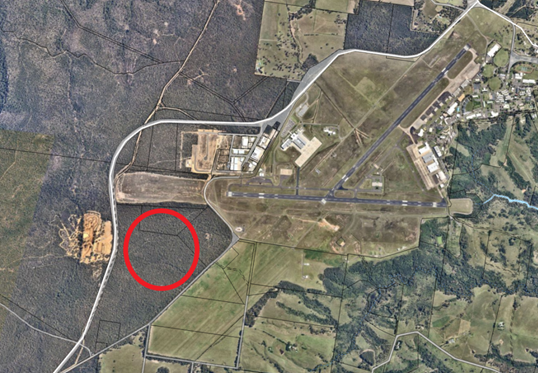 An aerial view of a runway

Description automatically generated