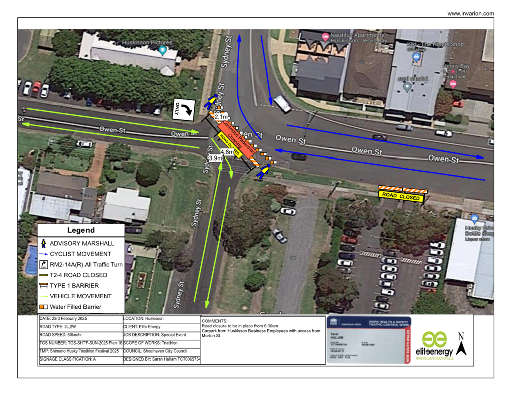 A map of a road with cars and buildings

Description automatically generated