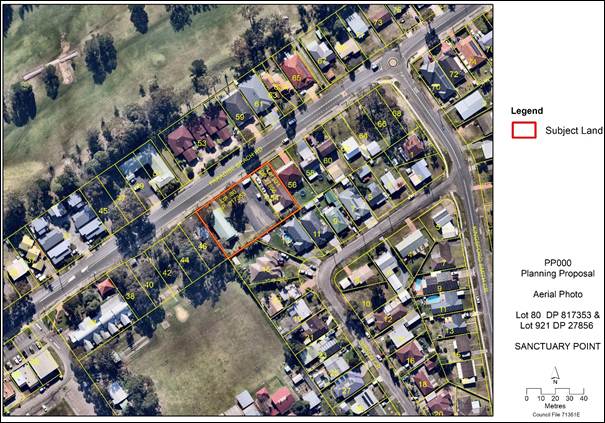 An aerial view of a neighborhood

Description automatically generated