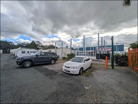 Cars parked in a parking lot

AI-generated content may be incorrect.