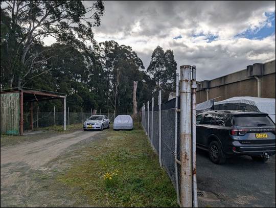 Cars parked cars on a dirt road

AI-generated content may be incorrect.